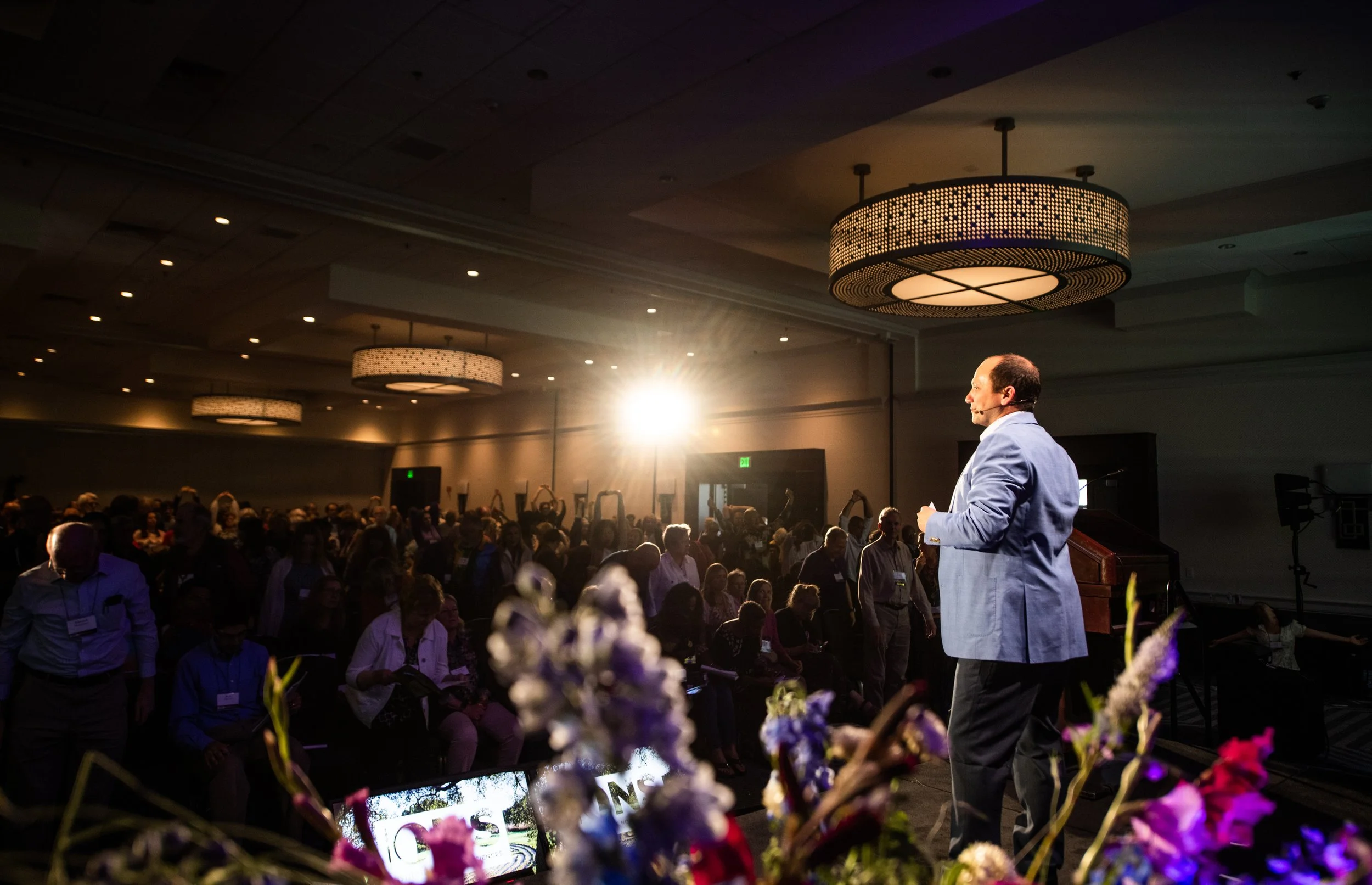Alex Morrison speaking at an event